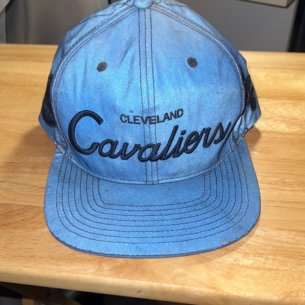 Cleveland Cavaliers navy blue strap back hat. Only worn a few times.